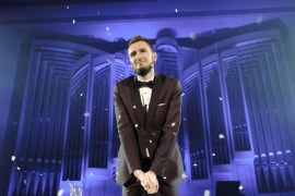 The Magician, basking in applause